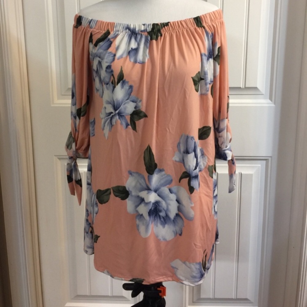 Off shoulder pink top with blue floral print